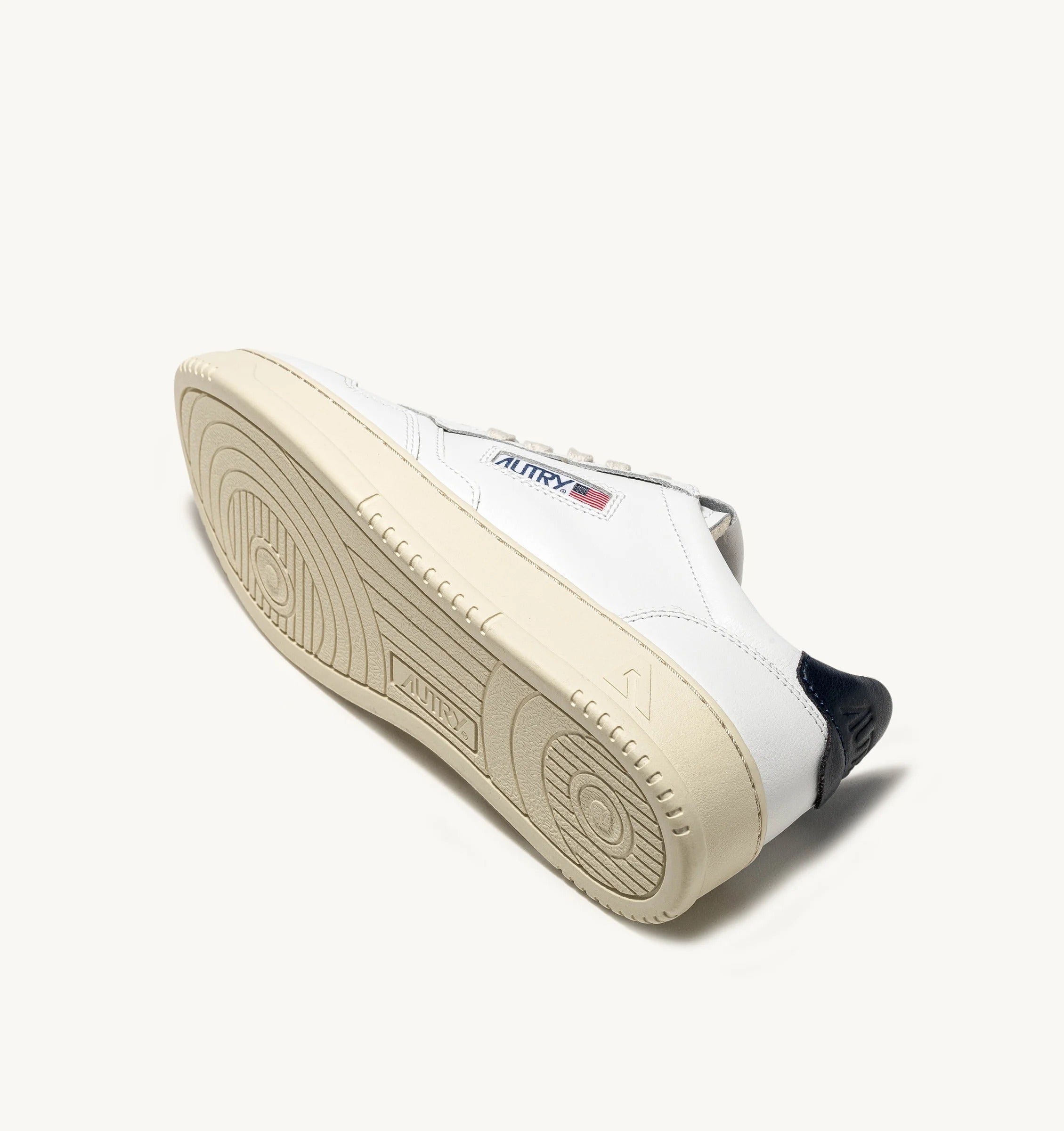 AUTRY SNEAKERS<BR/>SNEAKERS MEDALIST LOW IN PELLE BIANCA E SPACE AULM LL12 AUTRY ACTION SHOES