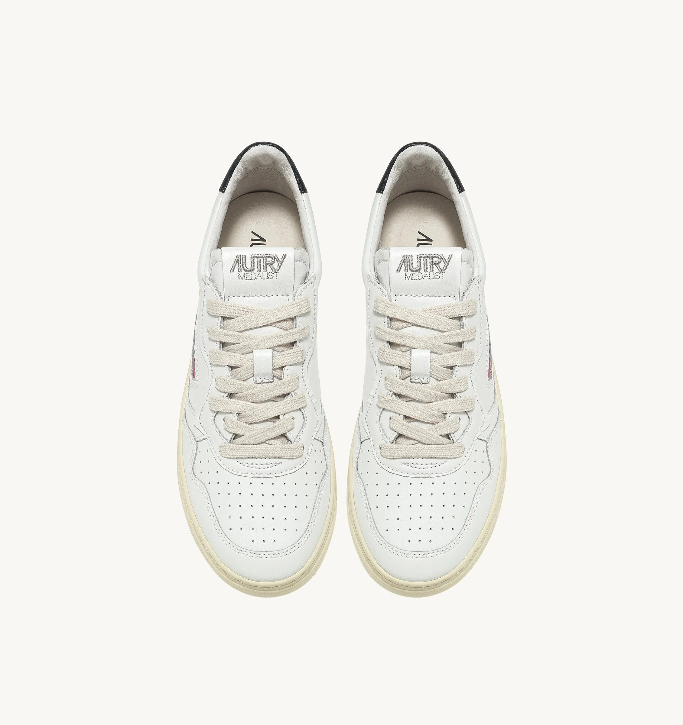 AUTRY SNEAKERS<BR/>SNEAKERS MEDALIST LOW IN PELLE BIANCA E NERA AULM LL22 AUTRY ACTION SHOES
