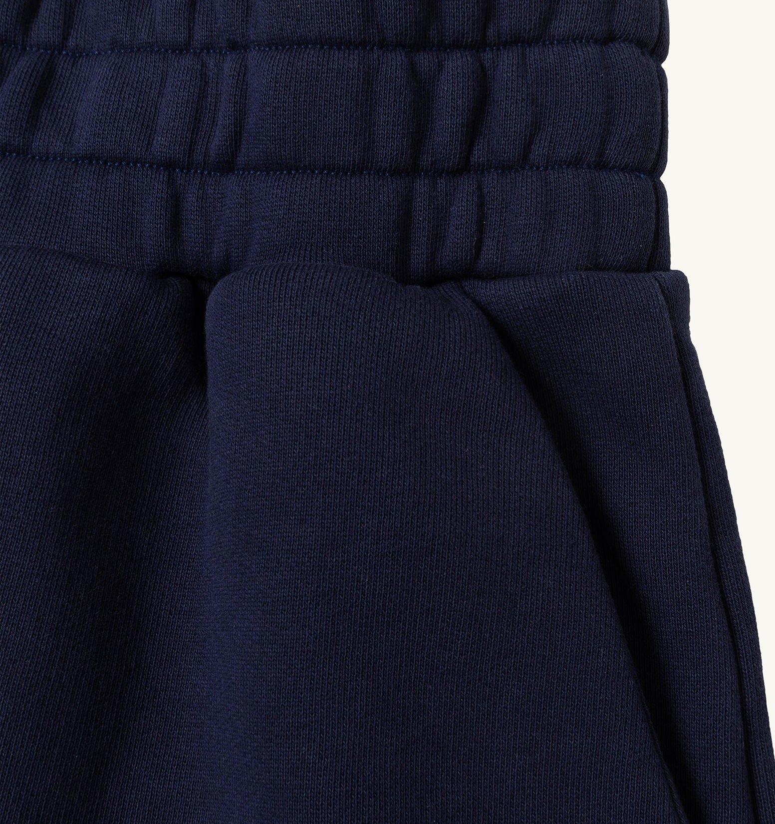 SHORTS SPORTIVI CON LOGO IN TONO