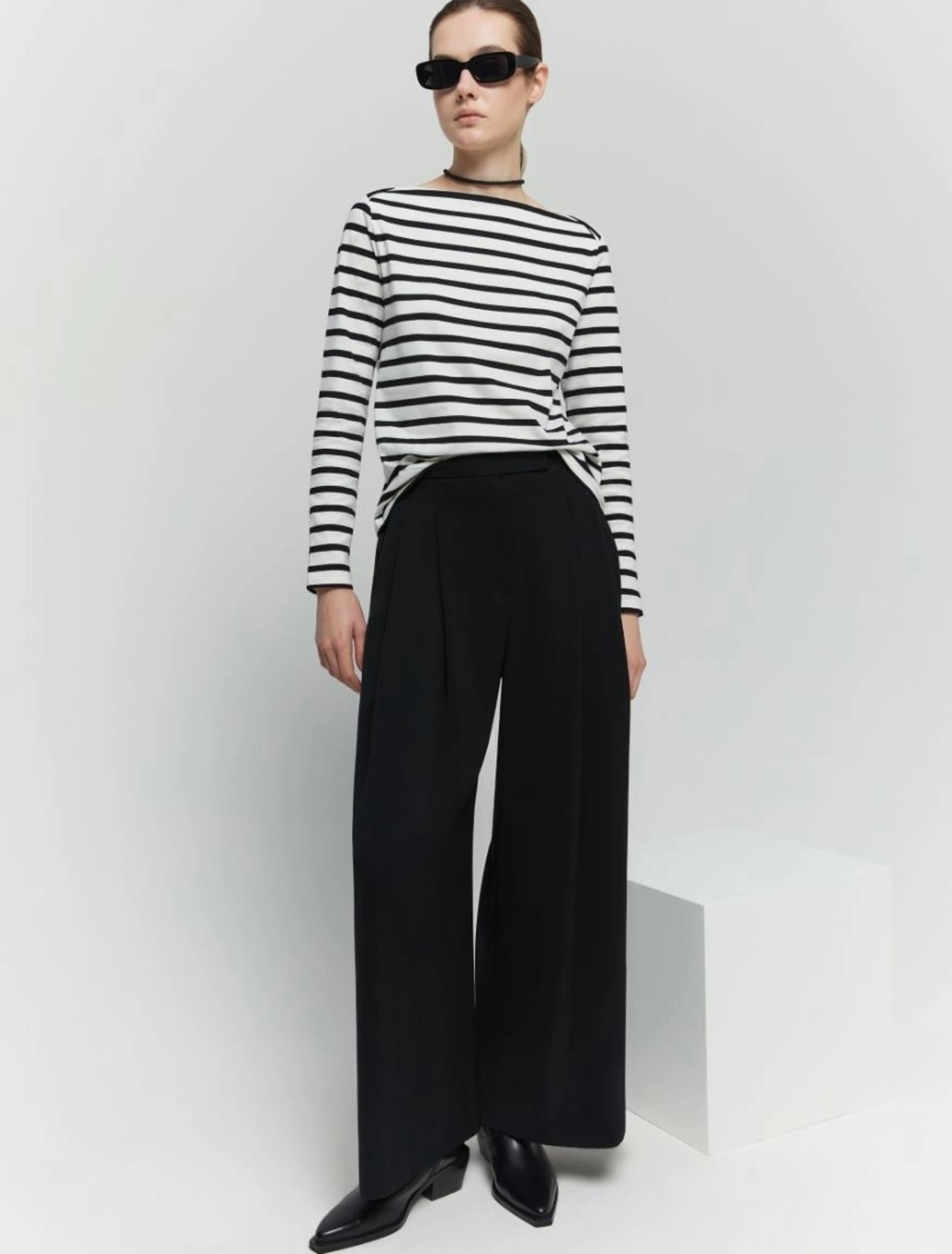 Pantaloni donna in crêpe fluido linea wide leg
