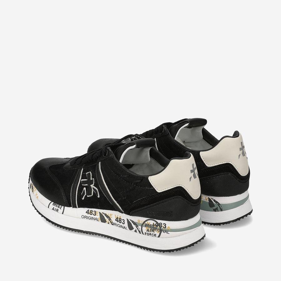 Conny women's shoe in leather and fabric