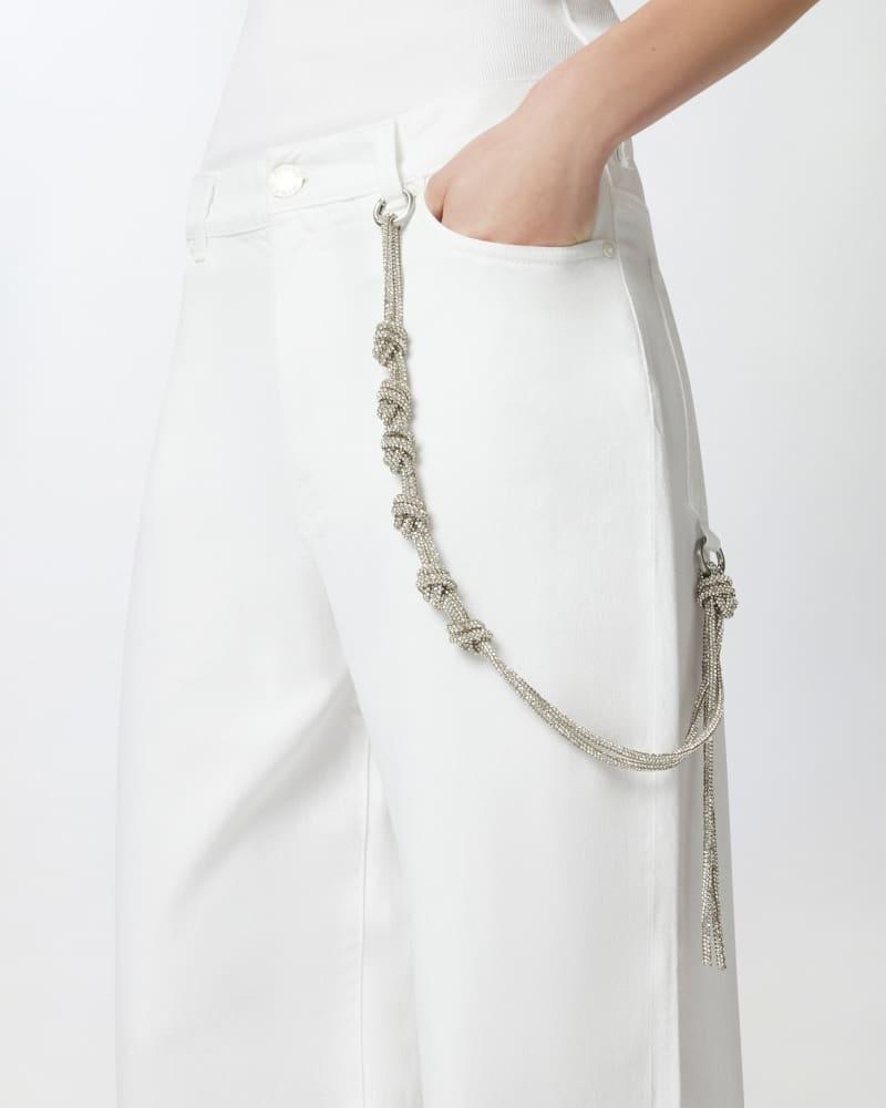 Pantaloni larghi loose fit con catena gioiello