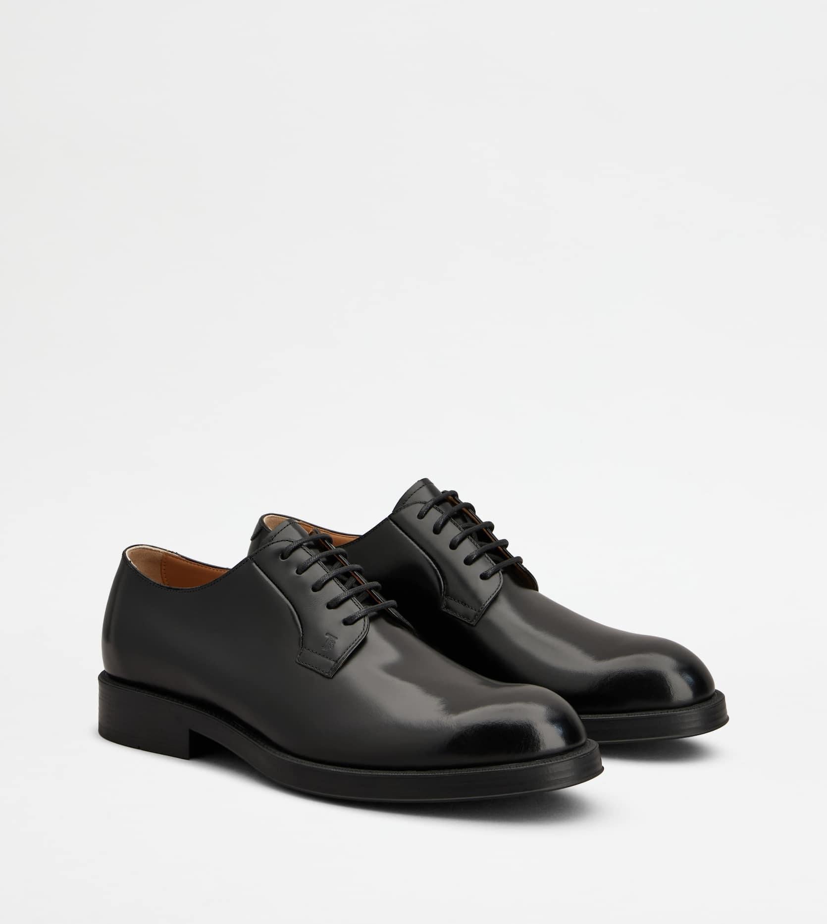 Stringata in Pelle XXM75L0JK80LYG B999 TOD'S