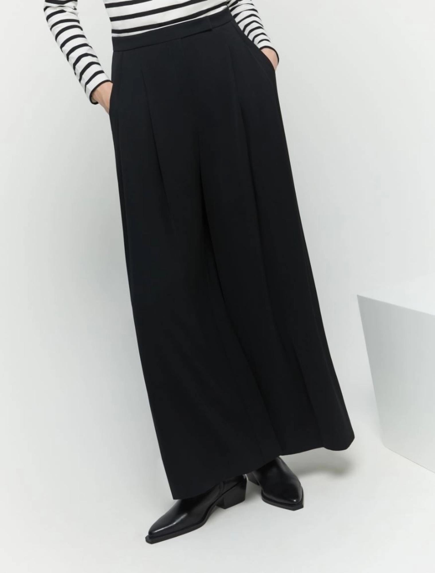 Pantaloni donna in crêpe fluido linea wide leg