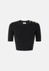 Top in maglia con dettagli gioiello