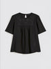 Top in tela di lino e jersey stretch