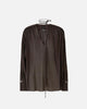 Blusa con scollo a V e arricci asola