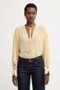 Blusa con scollo a V e arricci Asola