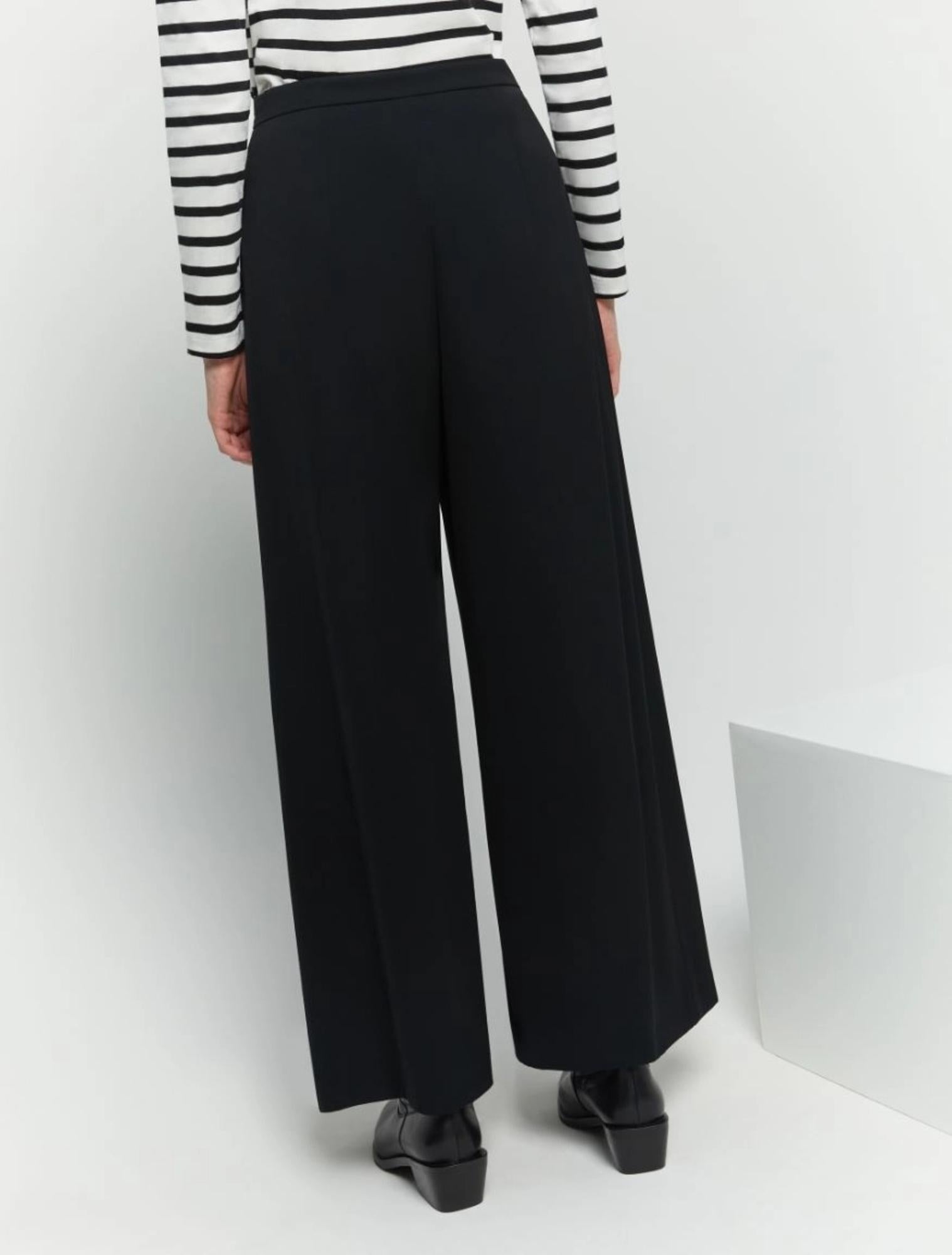 Pantaloni donna in crêpe fluido linea wide leg