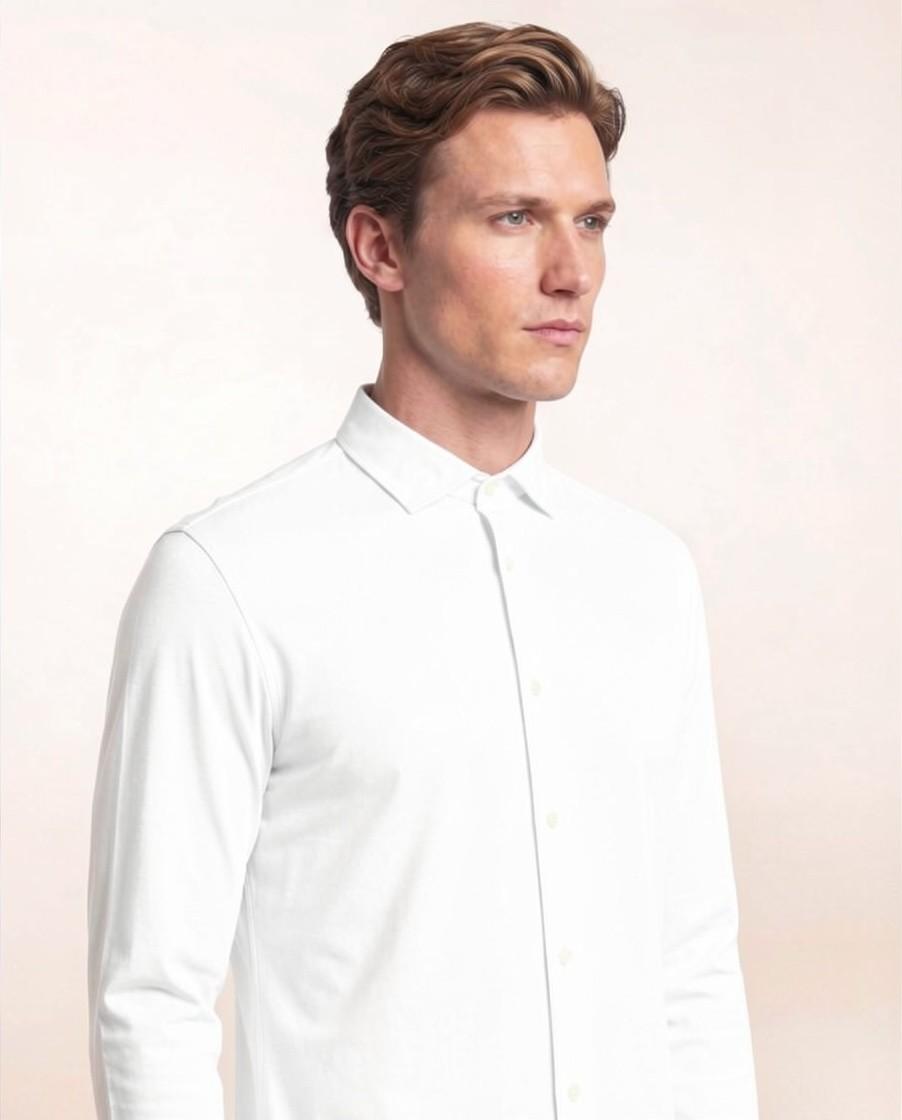 MANHATTAN<BR/>Camicia slim fit in tessuto tecnico unito high-performance MANHATTAN 100 CRUNA 
